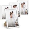 image:imageHAUS AND HUES 5x7 White Metal Picture Frames  Photo Frames 5X7  Features Premium Aluminum Vertical Hanging Easel Back for Tabletop Home Office 5x7 in White Set of 4